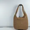 2026 Verano Nuevo Bolso de Hombro Tejido a Mano de Gran Capacidad Color Sólido Moderno Versátil Bolso para Vacaciones en la Costa Playa para Mujer