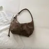 Otoño 2026 Nuevo Simple Elegante Estilo Coreano Ins Estilo Perezoso Alta Apariencia Viaje Bolso Cruzado Trendy Tipo Dumpling Mujer