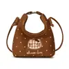 Otoño 2026 Nuevo Bolso de Hombro Bordado Corazón Dulce de Moda Dibujo Animado Lindo Bolso de Mano para Bebé Mini Bolso Infantil