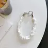 Pulseira de pulso estilo nicho de alta qualidade em seda plissada para cólon grande, nova capa de celular, cordão, pequena bolsa envelope de rede, pingente