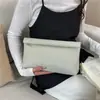 Bolso de Mano Sencillo para Mujer 2026 Nueva Moda Elegante Color Sólido Versátil Bolso Pequeño Sencillo Moderno Billetera para Monedas Bolso de Noche