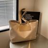 Bolsa Tote Casual Simples para Mulheres 2026 Nova Versátil de Grande Capacidade Bolsa para o Dia a Dia Moda de Nicho Bolsa de Ombro