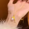 Nuevo Sombrero de Navidad Retro Otoño e Invierno Collar con Colgante de Perla Diseño de Nicho Único Cadena de Suéter de Gama Alta Elegante para Mujer