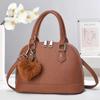 Nuevo bolso de mano tipo concha para mujer, bandolera de alta gama, estilo coreano, bolso cruzado sencillo y versátil.