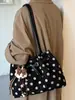 Bolso de mano simple de lunares estilo coreano Shuai Mi Jia para mujer, nuevo bolso tote moderno y elegante de nicho para el día a día 2026