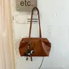 2026 nuevo bolso de mano casual retro elegante para el día a día, de color liso, gran capacidad, alta calidad, para mujer, un bolso tote visualmente atractivo