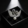 Broche de cisne de alta qualidade feminino pérola pin moda personalidade corpete pin coreano simples anti-exposição acessórios lote