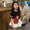 Bolso infantil estilo coreano 2026 nuevo modelo, bolso de mano de perlas para niños y niñas, bolso de hombro pequeño lindo y a la moda para que las niñas salgan