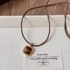 Pendientes de Moda Retro Maillard Estilo Hong Kong con un Toque Lujoso y de Alta Gama, Pendientes Colgantes y Conjunto de Collar con Piedra Ojo de Tigre