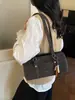 Bolsa Vintage de Nicho Melard para Mulheres Outono e Inverno 2025 Nova Versátil de Alta Qualidade para Ombro e Mão Bolsa Saco