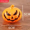 Bestseller transfronterizo Linterna de calabaza de Halloween Vela electrónica LED Ambiente festivo Adorno de Halloween