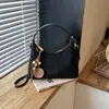 Bolso de mujer casual de cuero estilo coreano, nuevo modelo otoño e invierno 2026, versátil, de alta gama, bolsa de hombro tipo tote de gran capacidad para el día a día