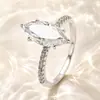 Suministro para transmisión en vivo de TikTok: Anillos de moissanita color H para mujer, plata de ley, un quilate, varios estilos, engaste de seis garras, venta al por mayor directamente del fabricante