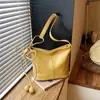 Bolso retro simple transfronterizo para mujer 2026 nuevo bolso de hombro cruzado casual versátil para el trabajo y los desplazamientos bolso tipo cubo