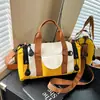 Nova Bolsa de Mão Color Block de Grande Capacidade Feminina Bolsa Cilíndrica Versátil Casual Transversal de Tecido Bolsa Transversal de Viagem com Múltiplos Bolsos