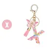 Llavero de moda con letras rosas, lentejuelas de amor, borla de mariposa, llavero, accesorios de colgante de epoxi de cristal para damas