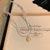 Novo Colar de Pérolas Coreano de Nicho para Mulheres, Corrente de Clavícula de Amor de Emenda Versátil, Acessórios de Contas de Temperamento de Luxo Leve Atacado
