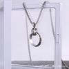 Collar de acero inoxidable de moda para hombres y mujeres cadena de suéter Sansheng III tres anillos anillo de acero inoxidable anillo entrelazado venta al por mayor