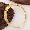 Moda europea y americana nuevo brazalete de hebilla micro-incrustada de circonita geométrica curva alta retención de color personalidad simple brazalete versátil