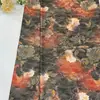 Elegante tela jacquard de seda estilo chino, reminiscentes del brocado de la dinastía Song, adecuada para prendas de abrigo de mujer, vestidos, chalecos y bolsos, con un patrón floral clásico.