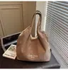 Bolso Texturizado Estilo Coreano Transfronterizo Estilo Perezoso 2025 Nuevo Gran Capacidad Casual Invierno Rayado Bordado Bolso de Hombro
