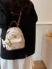Mochila de estilo lujo ligero con estampado de oso para mujer, mini mochila versátil coreana con un toque juvenil, adecuada para estudiantes y para ir al trabajo.