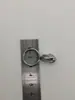 Cabeça de zíper de fábrica em estoque Nº 3 Nº 5 eletroforese platina fundo de nylon cabeça de travamento puxador de zíper atacado