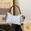 2026 Nuevo Bolso de Hombro de Lunares de Alto Valor para Mujer Estilo Coreano Bolso Cuadrado Pequeño Moda Bolso para el Hombro para el Trabajo Bolso Cruzado Versátil