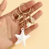 Creativo Vida Marina Colorido Halo Perla Estrella de Mar Llavero Colgante Lindo Colorido Estilo Océano Adorno de Estrella