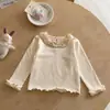 Nova Camisa Base Feminina Outono/Inverno 2026 Top Elegante Infantil com Gola Alta e Babados para Meninas Mais Velhas