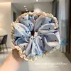 Selección PremiumElásticos elegantes y con estilo, nueva colección de accesorios para el cabello de nicho de alta gama para recoger el cabello en la parte posterior de la cabeza