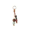 Colgante de Bolsa con Cuentas de Cerámica de Colores Tejido a Mano Piedra Cuentas de Madera Colgante de Bolsa Longxiang Accesorios de Llavero de Moda