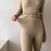 Traje de lana de oveja de otoño e invierno de la sociedad coreana, sensación ligera, fiebre, levantamiento de cadera, barriga, sin costuras, ropa interior térmica agradable para la piel, ropa y pantalones de otoño para mujer
