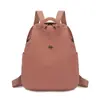 Mochila casual série cor sólida minimalista estilo japonês, estilo artístico, adequada para o trajeto diário de meninas e viagens ao ar livre, mochila versátil