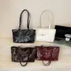 Bolso de axila de nicho transfronterizo estilo coreano para mujer, nuevo modelo 2026, gran capacidad, moderno, versátil, bolso tote, bolso de hombro