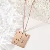 Collar de Acero de Titanio de Venta Caliente Transfronteriza Colgante Cuadrado Hueco Personalizado para Hombres y Mujeres Joyería Versátil de Alta Gama Europea y Americana
