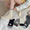 Calcetines Holgados Estilo Universitario Retro Otoño/Invierno Xiaowu para Mujer, Calcetines de Media Pantorrilla de Algodón Puro Sin Costuras Estilo Japonés con Estampado de Perro y Borde de Volantes