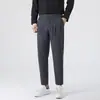 Nuevos pantalones casuales elásticos, holgados, cómodos, de alta gama, versátiles, modernos, para hombre, de nueve puntos, primavera y otoño, nuevos pantalones para hombre
