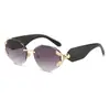 Gafas de sol sin montura nuevas 2026, Montura grande, Gafas de moda personalizadas, Gafas de sol estilo Ojo de Gato europeas y americanas transfronterizas para mujer, Estilo de alta gama