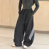 Calça casual esportiva para meninas 2026 nova elegante de outono calça de malha de perna larga para meninas transfronteiriça