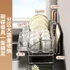 El fabricante suminista un escurridor de cuenco para utensilios de cocina y vajilla, un escurridor de almacenamiento para encimeras del hogar y un estante de almacenamiento para cuchillos y tablas de cortar.