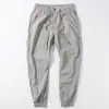 Pantalones Largos Casuales Simples Holgados Delgados de Verano para Hombre Marca de Moda Elásticos Seda de Hielo Secado Rápido Pantalones Deportivos