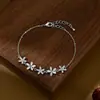 Estilo Nuevo Primavera y Verano Zirconia Micro-pavimentada Temperamento Joyería de Mano Diseño de Nicho para Mujer Pulsera de Ojo de Gato Pétalo Pulsera Versátil