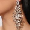 Pendientes de hojas geométricas con diamantes de imitación de AliExpress, tendencia de temperamento, pendientes exagerados con diamantes, pendientes europeos y americanos.