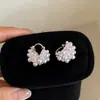 Elegante HerederaEstilo Fresco Bolso de Lunares Plateados Arete Arete Único Mujer 2026 Aretes Súper Hermosos
