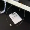 Colar Minimalista Versátil de Pérola Única Design de Nicho Estilo Ins Corrente de Clavícula de Luxo Leve Temperamento de Comutador Celebridade da Internet Acessório