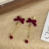 Pendientes de botón con lazo flocado de Año Nuevo, dulces, de lujo ligero, simples, diseño micro-incrustado, temperamento versátil, pendientes personalizados