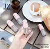 Pedido Jinze: Botella Redonda con Tapa de Bola, Forma Irregular, Tubo de Brillo de Labios con Pincel Fino/Grueso, Material de Empaque de Plástico