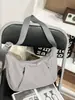 Bolsa de dumpling fruncida Mi Xing Qian Ting para parejas, estilo minimalista japonés, adecuada para exploración urbana, clases y compras, bolso cruzado