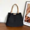 Bolsa de lona para mujer de gran capacidad, casual, al por mayor, nueva moda 2026, simple, de un solo hombro, bolsa de compras, bolsa de axila para ir al trabajo
